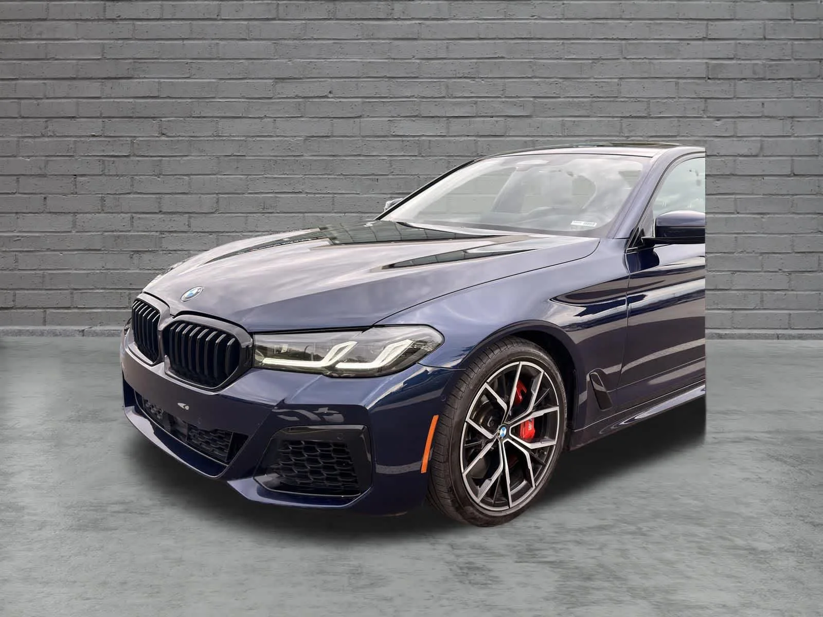 Used 2022 Tanzanite Blue II Metallic BMW M550i xDrive image 2