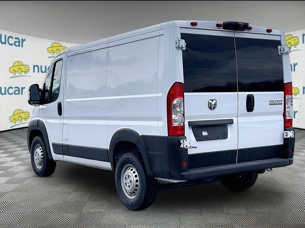 New 2026 Bright White Clearcoat Ram Low Roof image 5