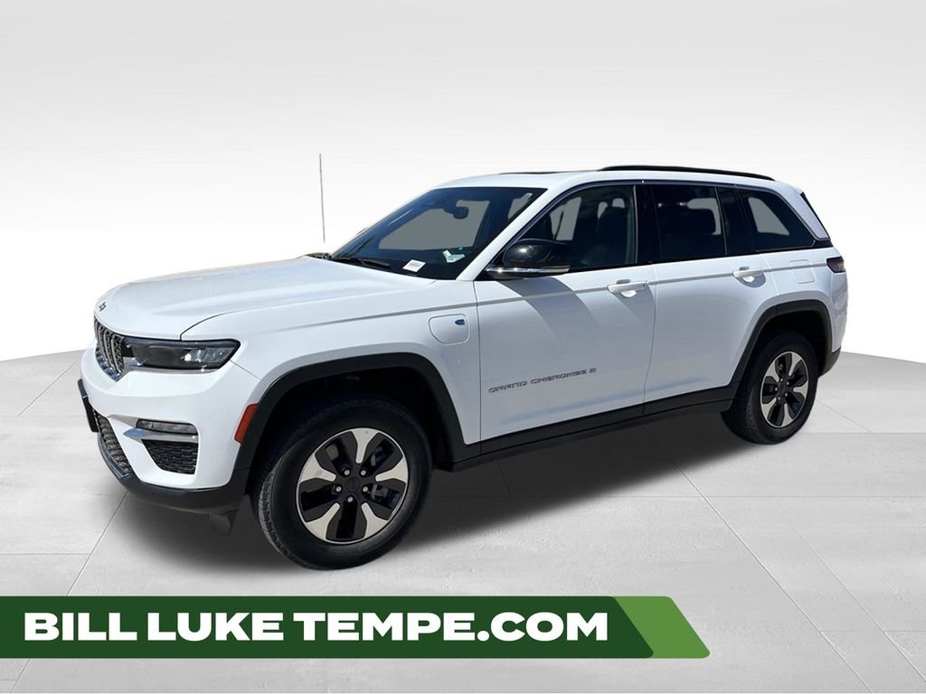 Used 2024 Bright White Clearcoat Jeep 4xe image 1