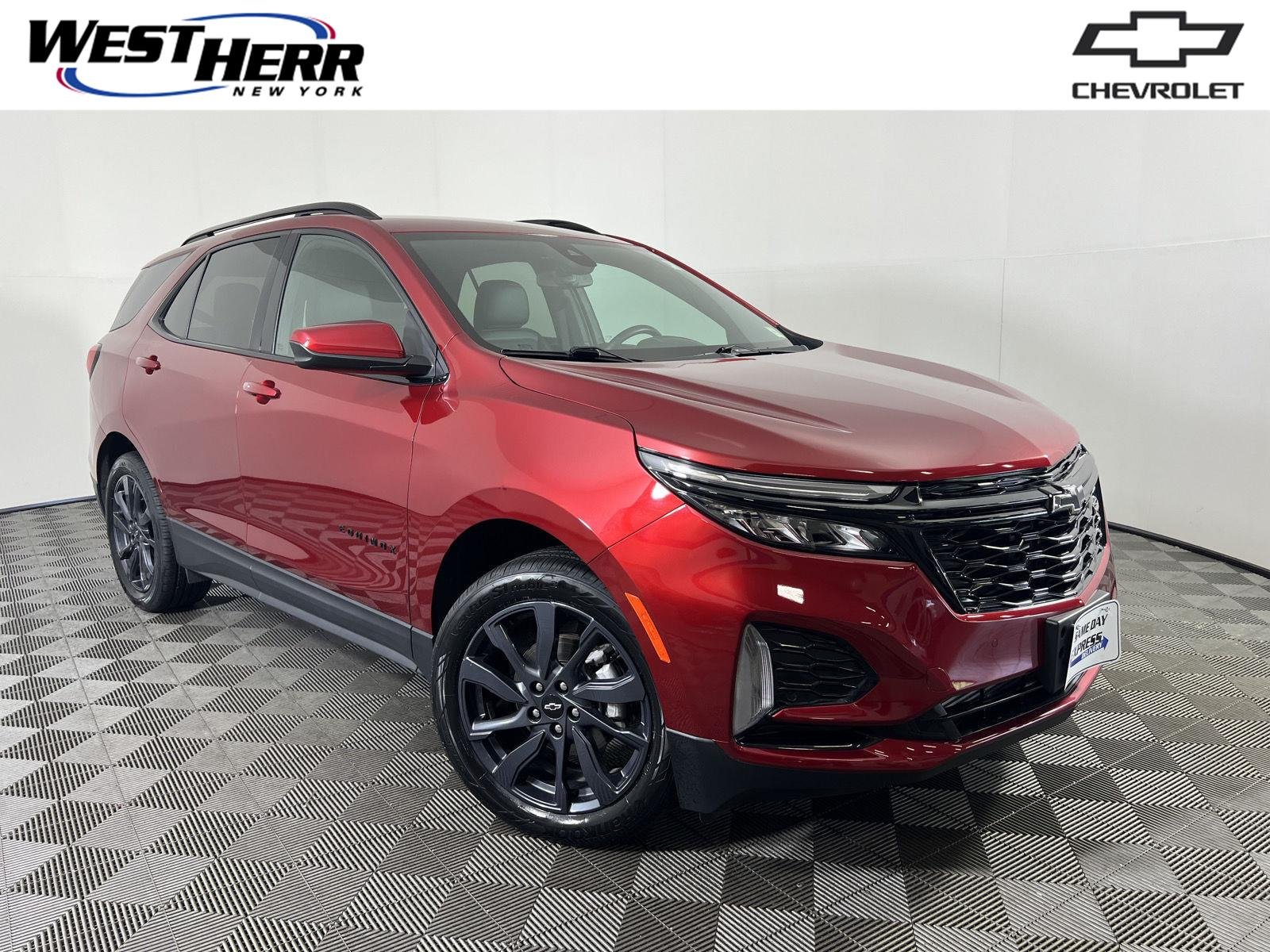 Used 2024 Radiant Red Tintcoat Chevrolet RS image 1