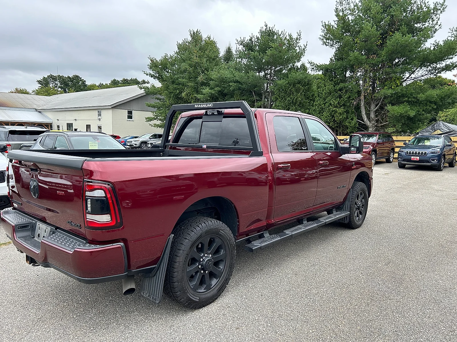 Used 2023 Delmonico Red Pearlcoat Ram Laramie Crew Cab 4x4 6