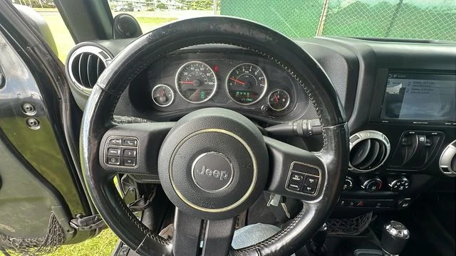 Used 2012 Black Jeep Sahara image 21