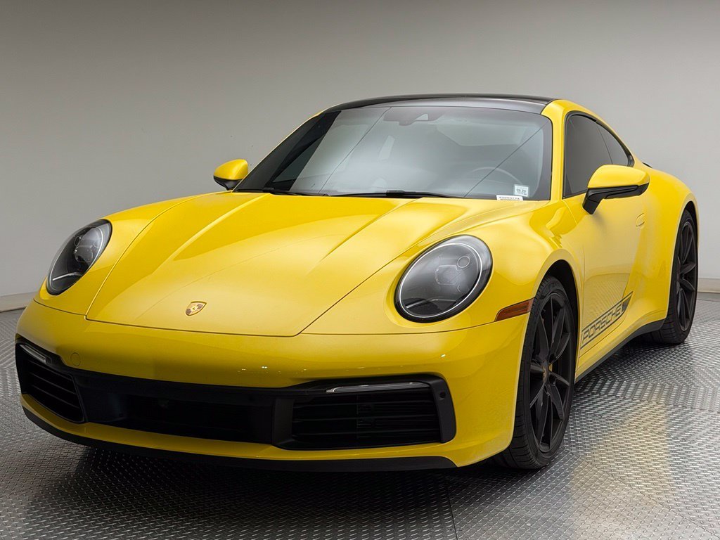 Used 2021 Racing Yellow Porsche Carrera image 1