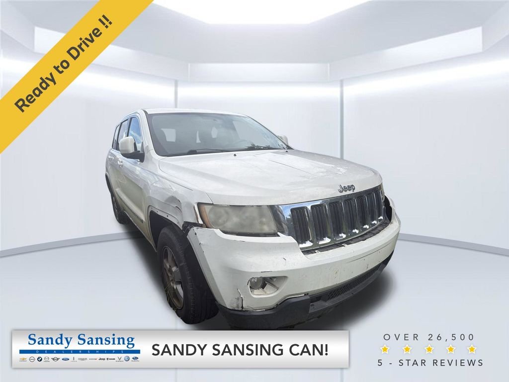 Used 2012 White Jeep Laredo image 1