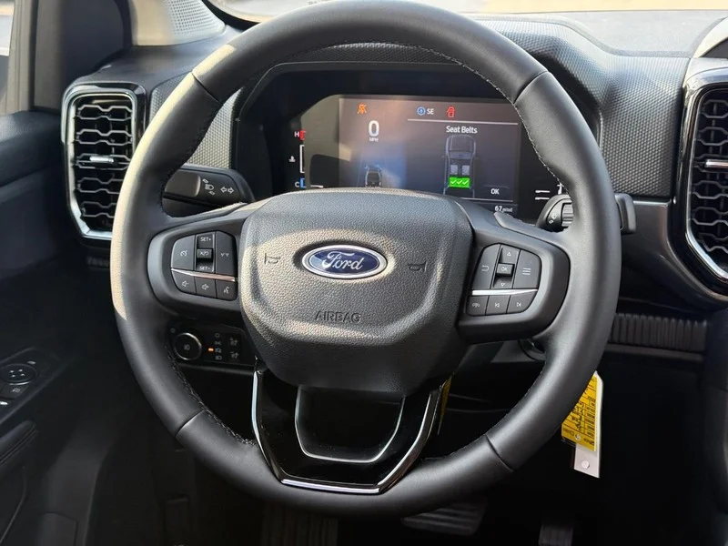 New 2026 Carbonized Gray Metallic Ford XLT 4WD SuperCrew 5