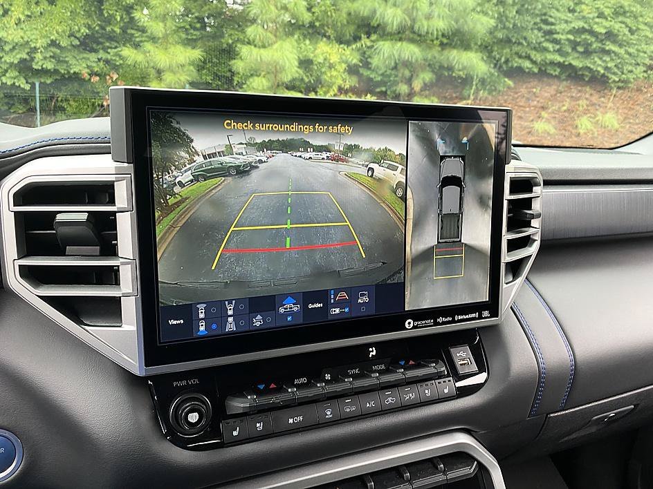 Used 2024 Magnetic Gray Metallic Toyota Platinum Hybrid image 18