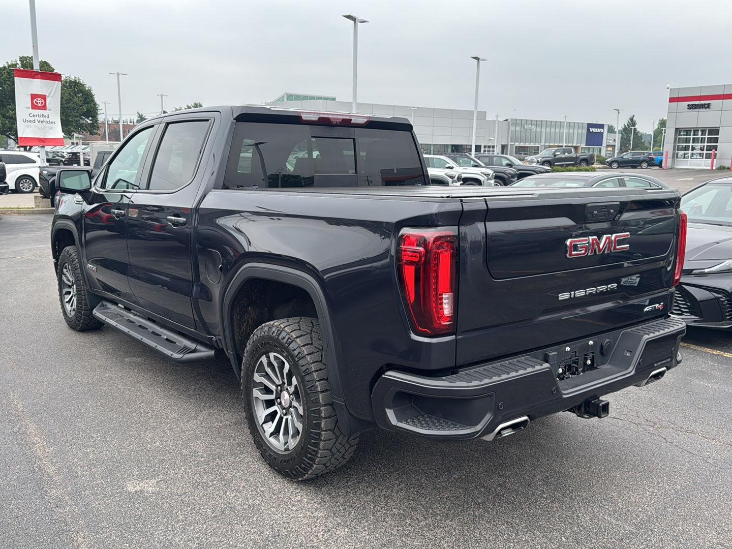 Used 2023 Titanium Rush Metallic GMC AT4 image 4