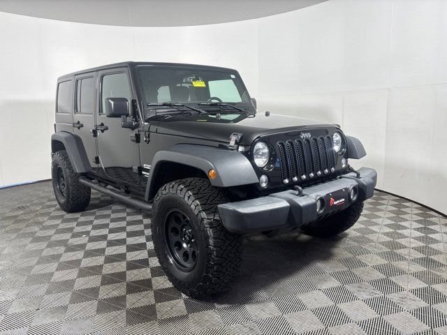 Used 2017 Black Jeep Unlimited Sport image 1