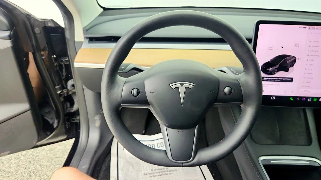 Used 2023 Solid Black Tesla RWD image 13