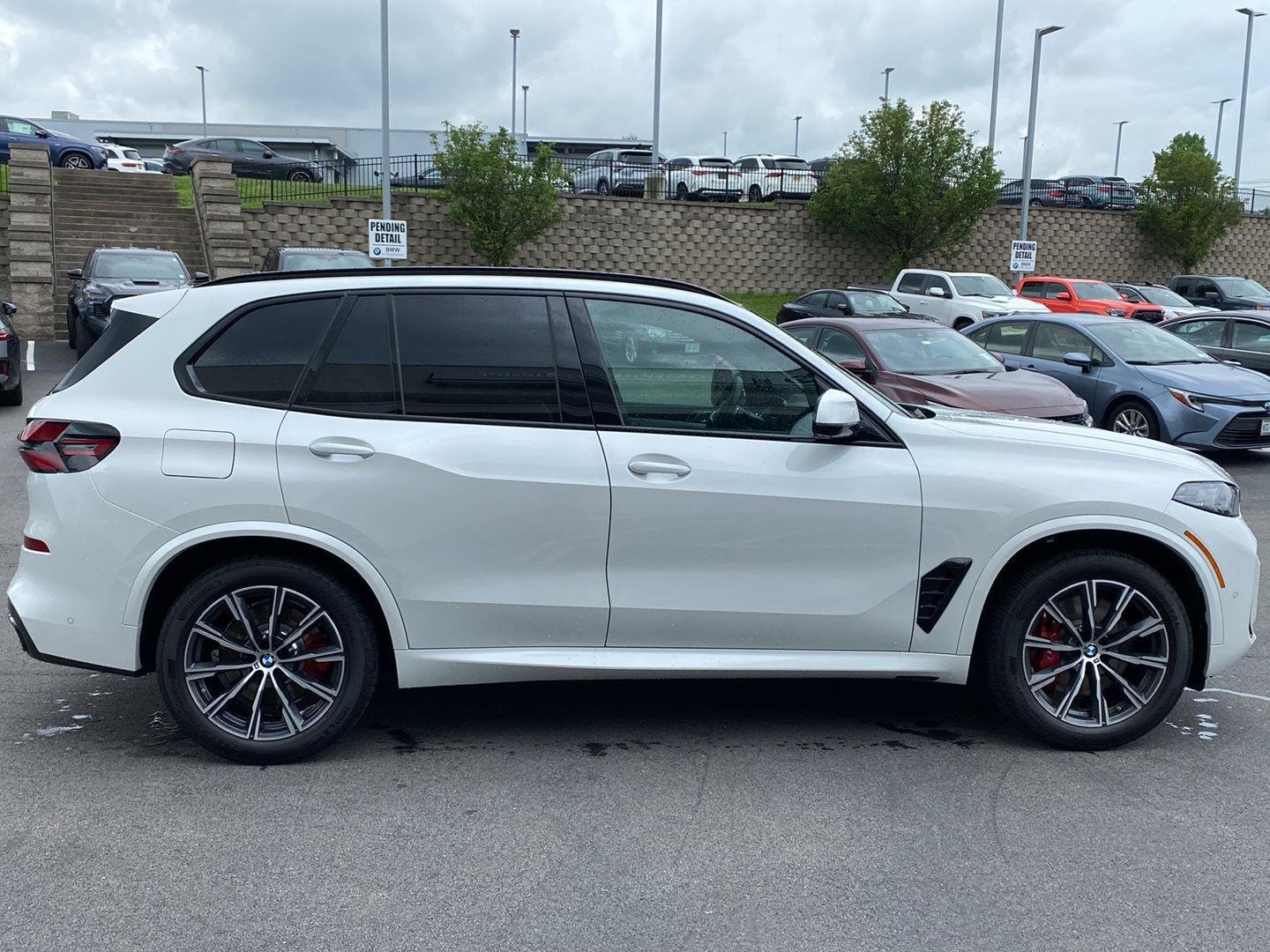 Used 2026 Mineral White Metallic BMW xDrive50e image 2
