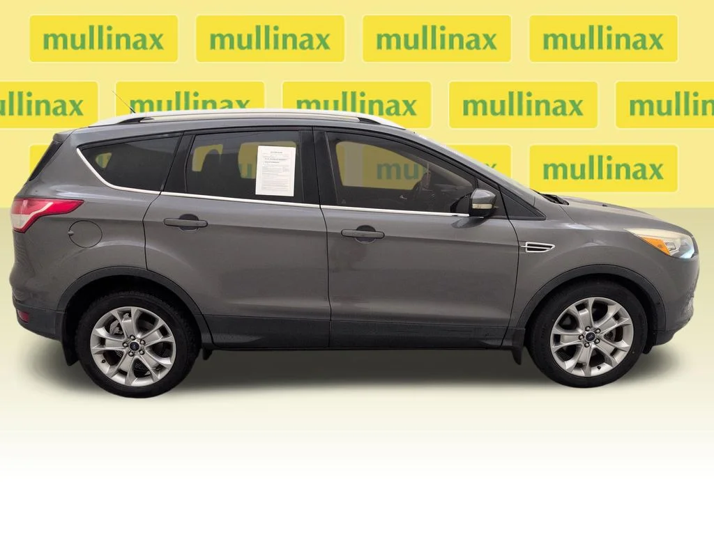 Used 2014 Ford Escape Titanium with VIN 1FMCU0J9XEUC04749 for sale in Kissimmee, FL