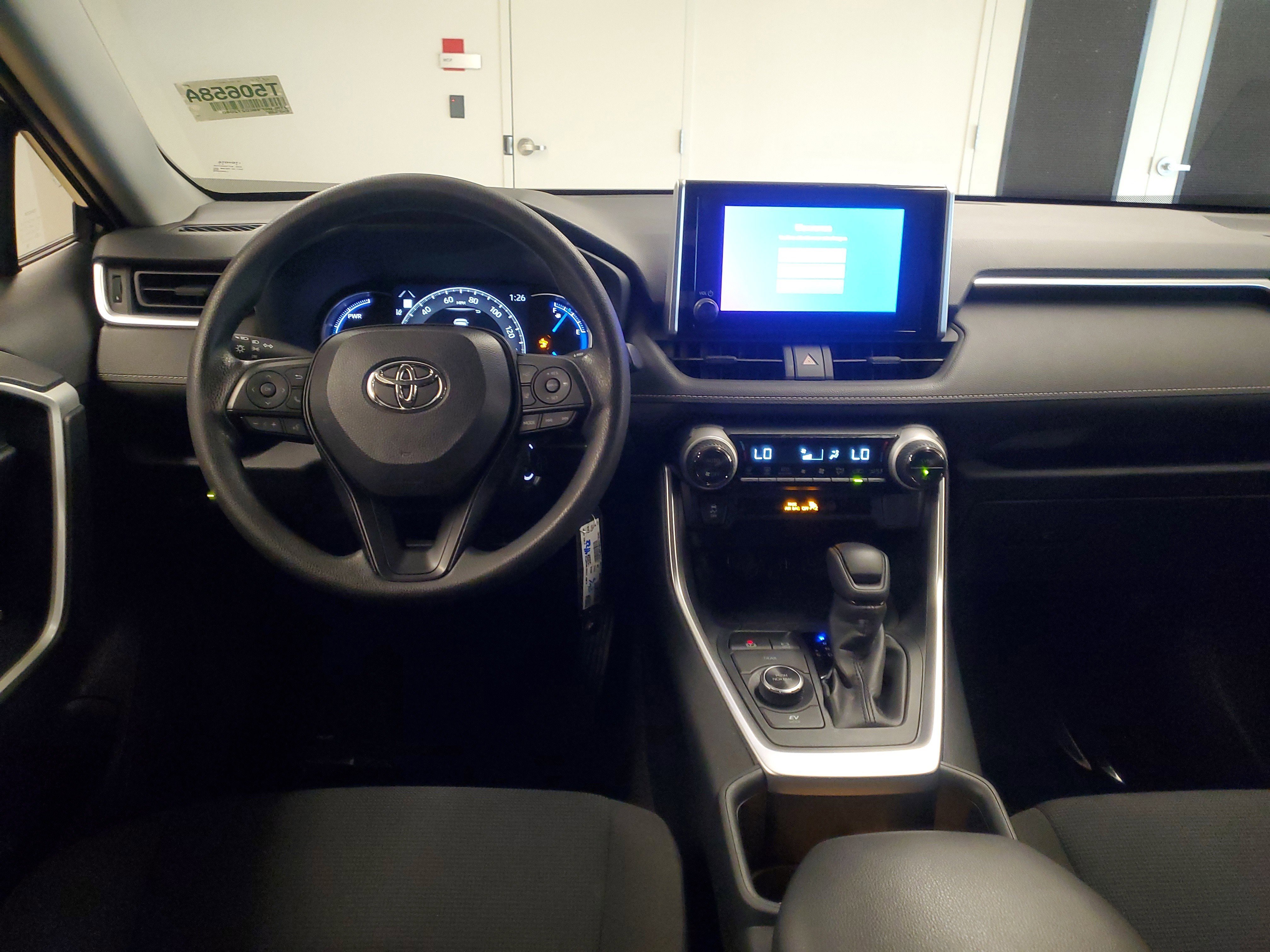 Used 2024 Midnight Black Metallic Toyota Hybrid LE image 9