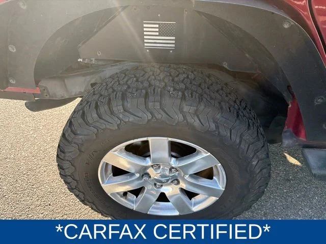 Used 2013 Red Jeep Unlimited Sahara image 3