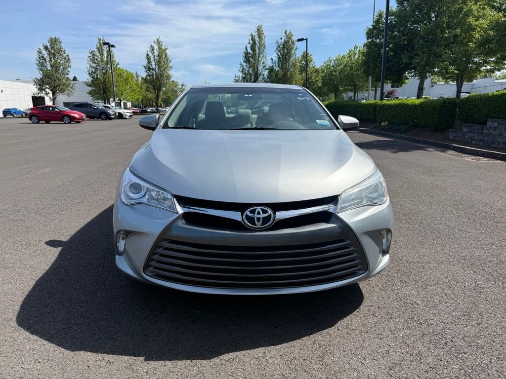 Used 2015 Celestial Silver Metallic Toyota LE image 2