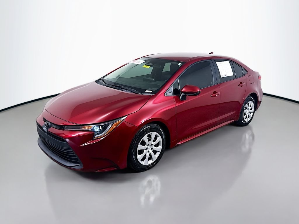 Used 2023 Ruby Flare Pearl Toyota LE image 3