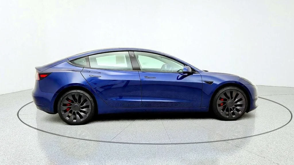 Used 2022 Deep Blue Metallic Tesla Performance AWD image 4