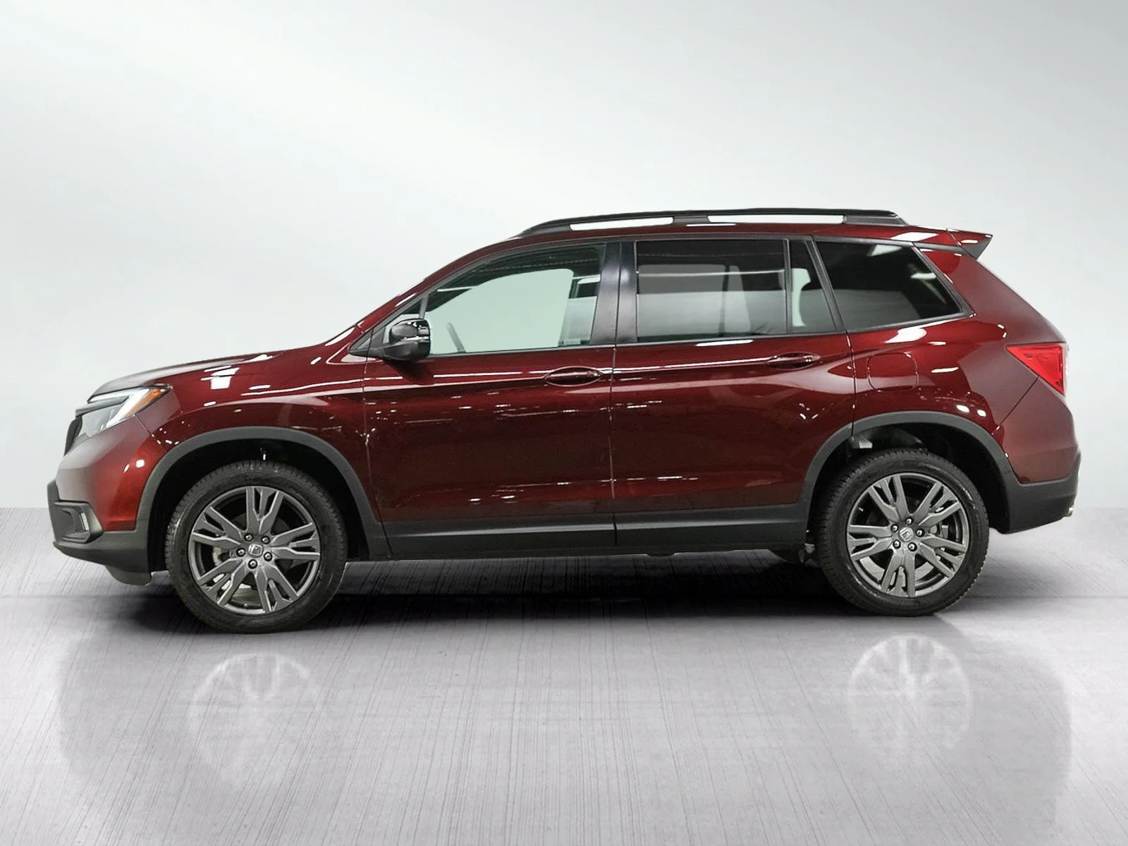 Used 2021 Honda Passport EX-L with VIN 5FNYF8H55MB038847 for sale in Burnsville, Minnesota