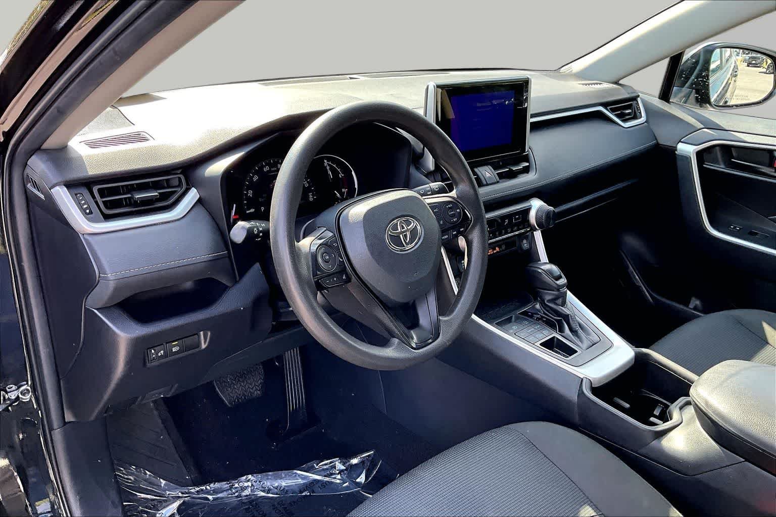 Used 2024 Midnight Black Metallic Toyota LE image 28