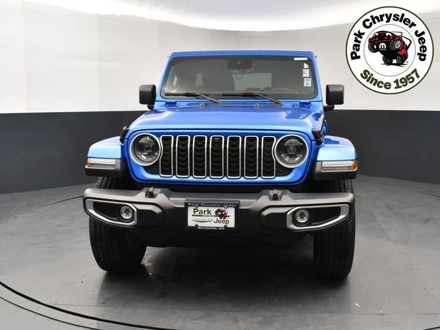 Used 2024 Jeep Wrangler 4-Door Sahara with VIN 1C4PJXEG1RW301297 for sale in Burnsville, Minnesota