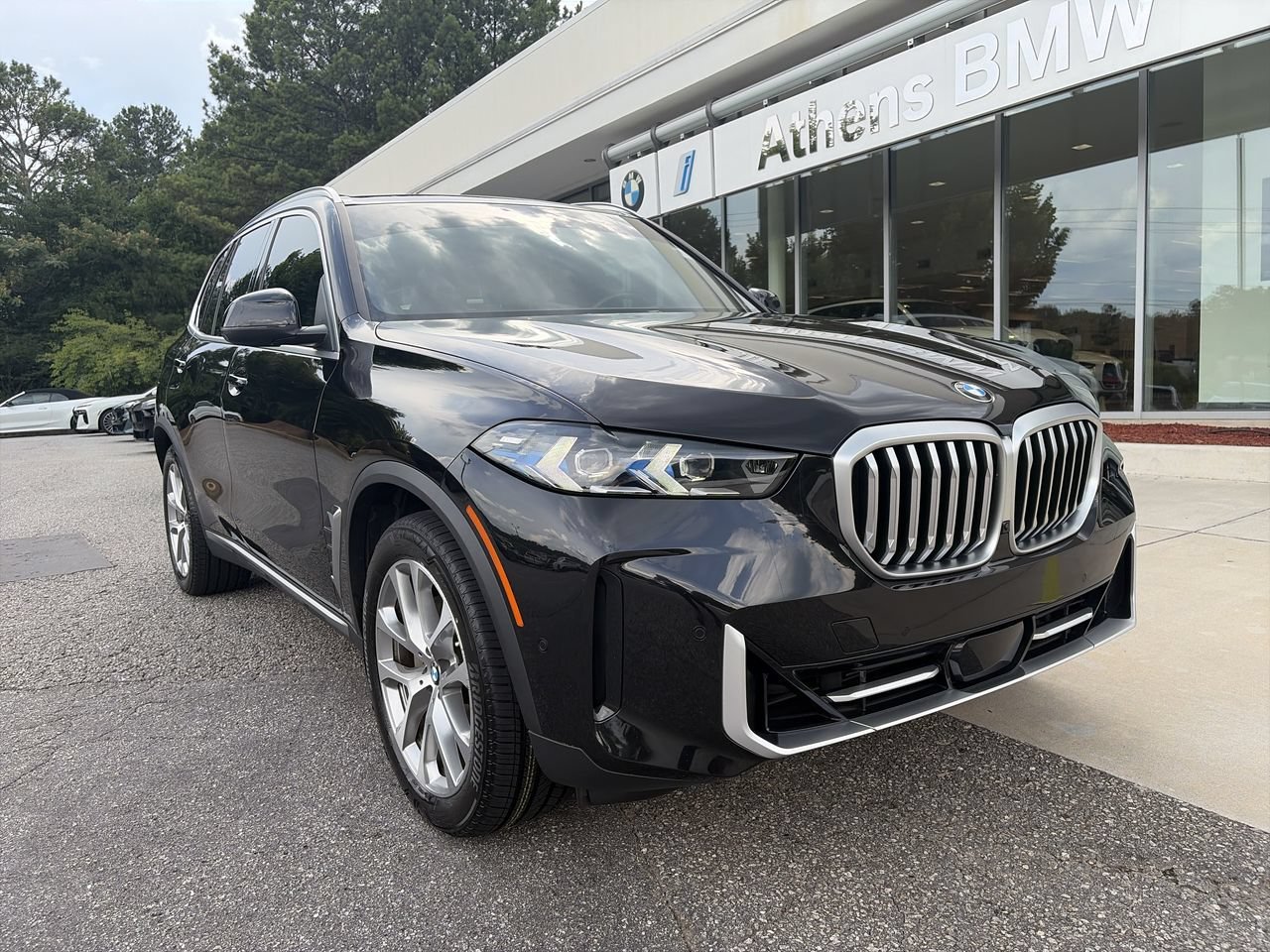 Used 2024 Black Sapphire Metallic BMW xDrive40i image 1