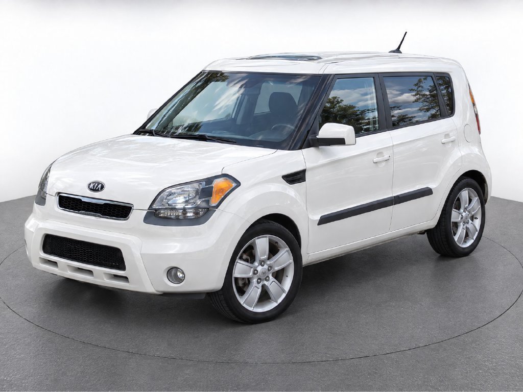Used 2011 Beige Kia Exclaim image 1