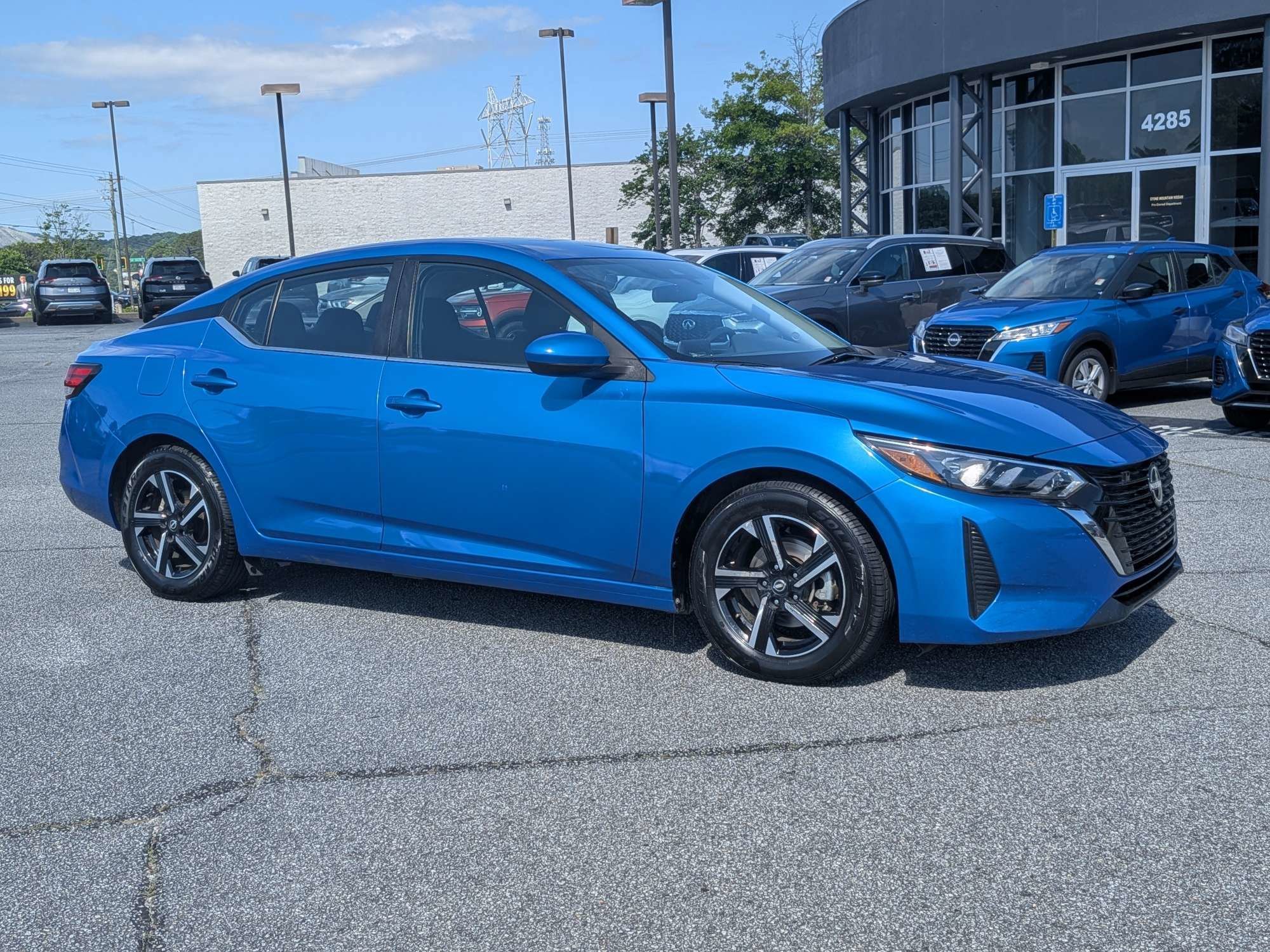 Used 2024 Blue Nissan SV image 1