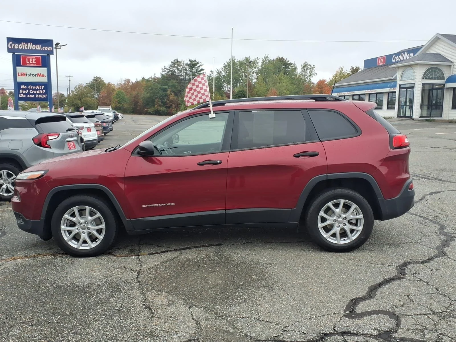 Used 2017 Deep Cherry Red Crystal Jeep Sport image 7