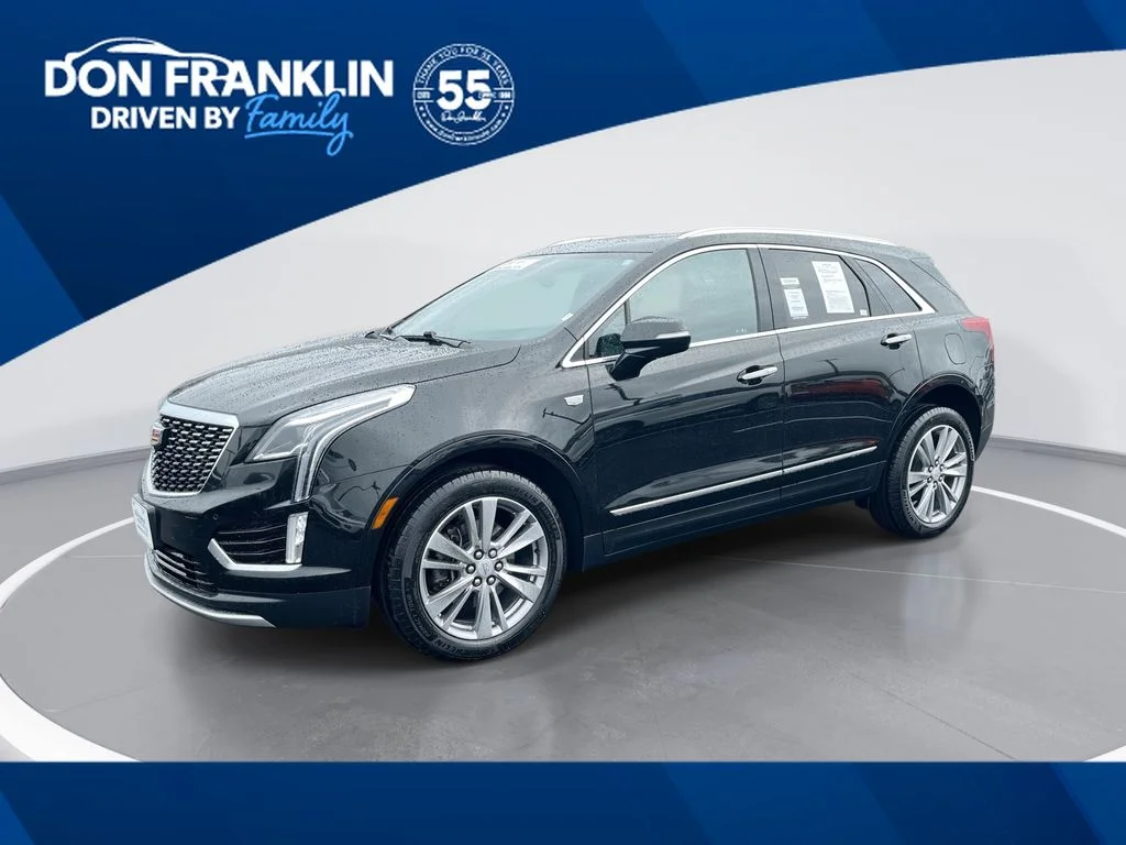 Used 2024 Black Cadillac Premium Luxury image 1