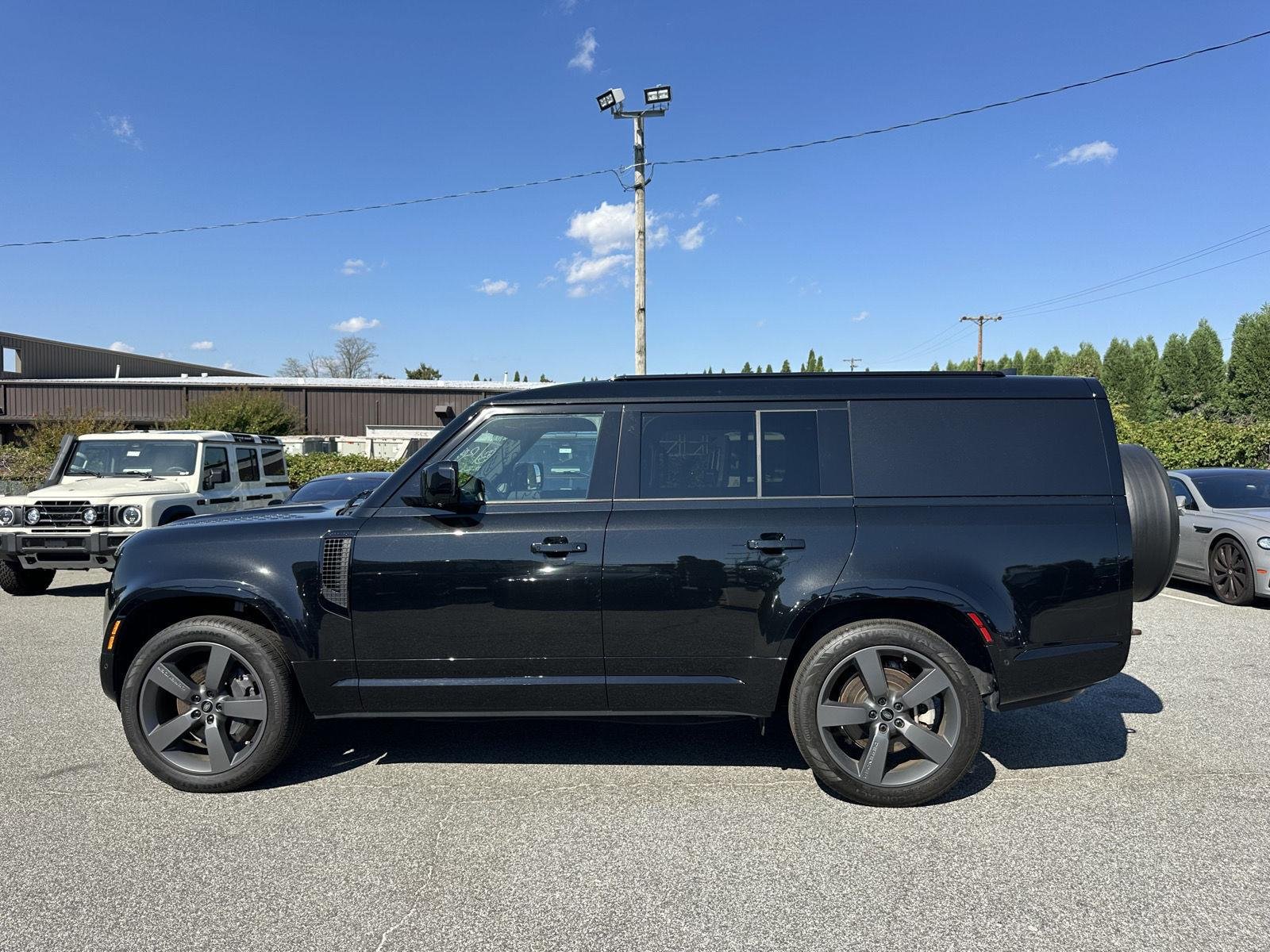 Used 2024 Santorini Black Metallic Land Rover Outbound image 2
