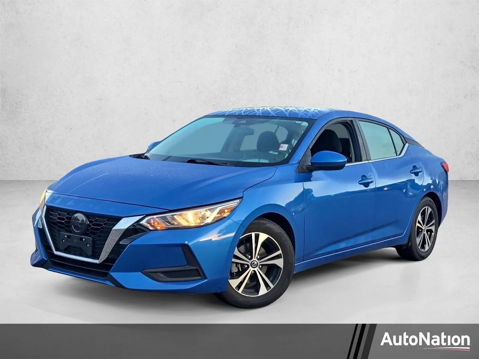 Used 2023 Electric Blue Metallic Nissan SV image 1
