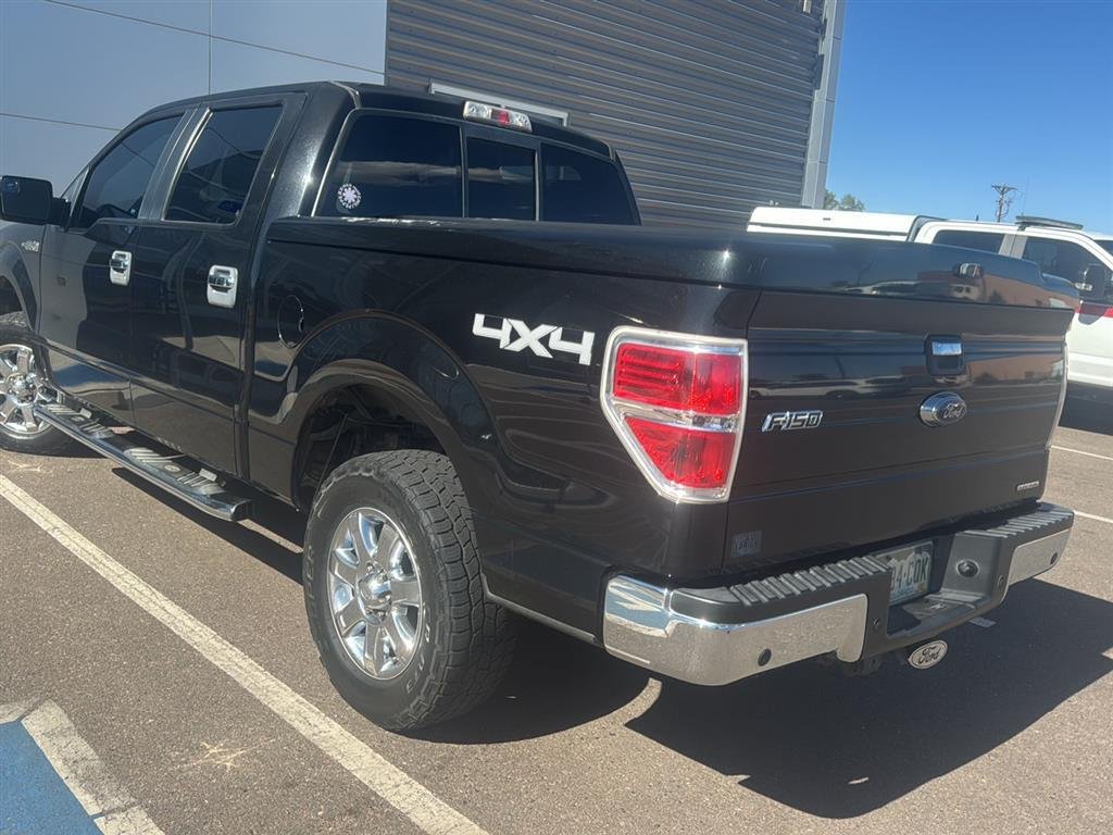 Used 2013 Tuxedo Black Metallic Ford XLT image 7