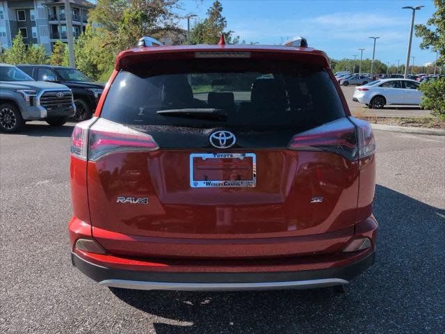 Certified Used 2016 Hot Lava Toyota SE image 5
