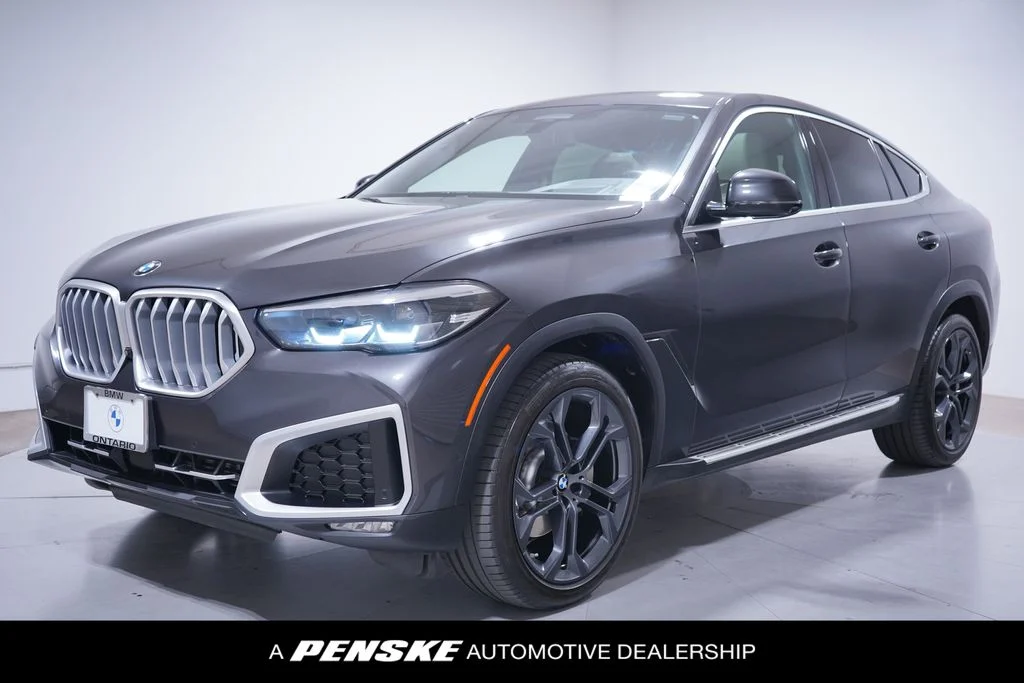 Used 2021 Dark Graphite BMW xDrive40i image 1
