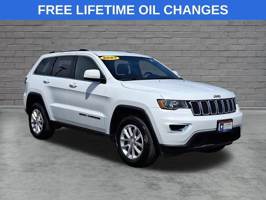 Used 2021 Bright White Clearcoat Jeep Laredo E image 1