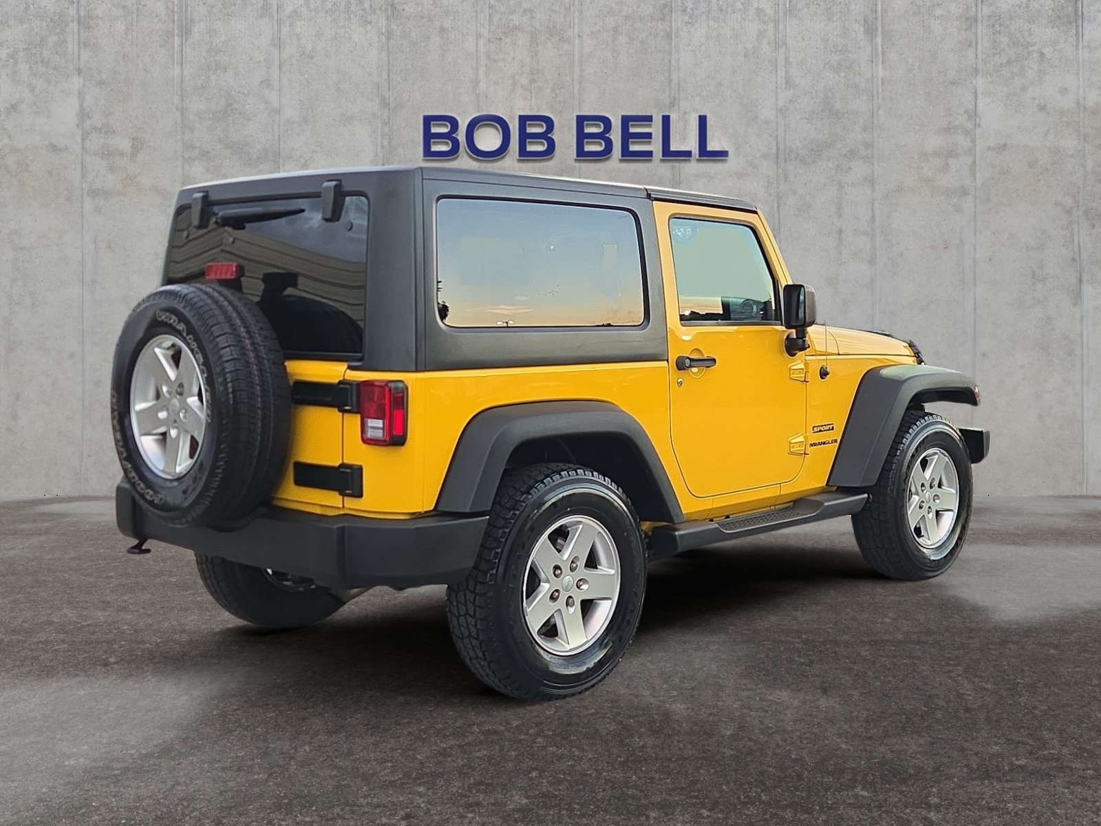 Used 2015 Baja Yellow Clearcoat Jeep Sport image 5