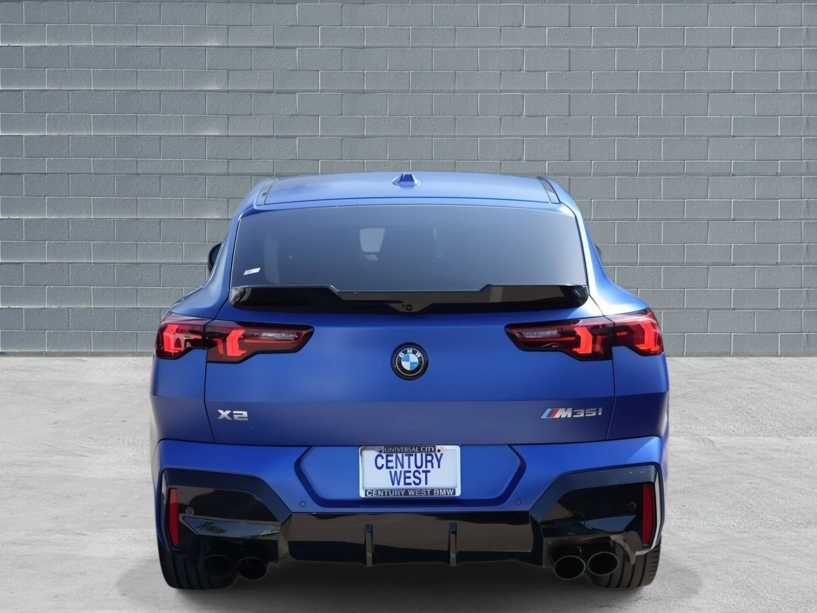 Used 2024 Frozen Portimao Blue II Metallic BMW M35i Sports Activity Coupe image 4