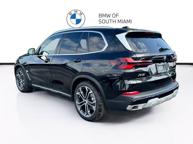 New 2026 Black BMW xDrive50e image 4