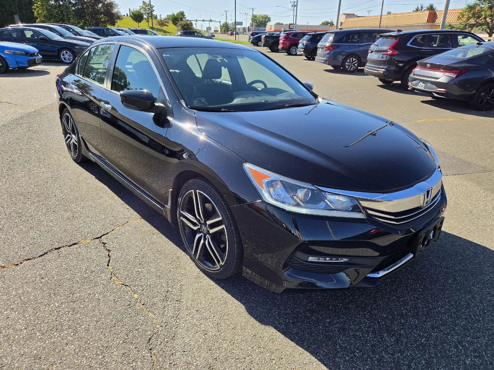 Used 2016 Crystal Black Pearl Honda Sport image 1