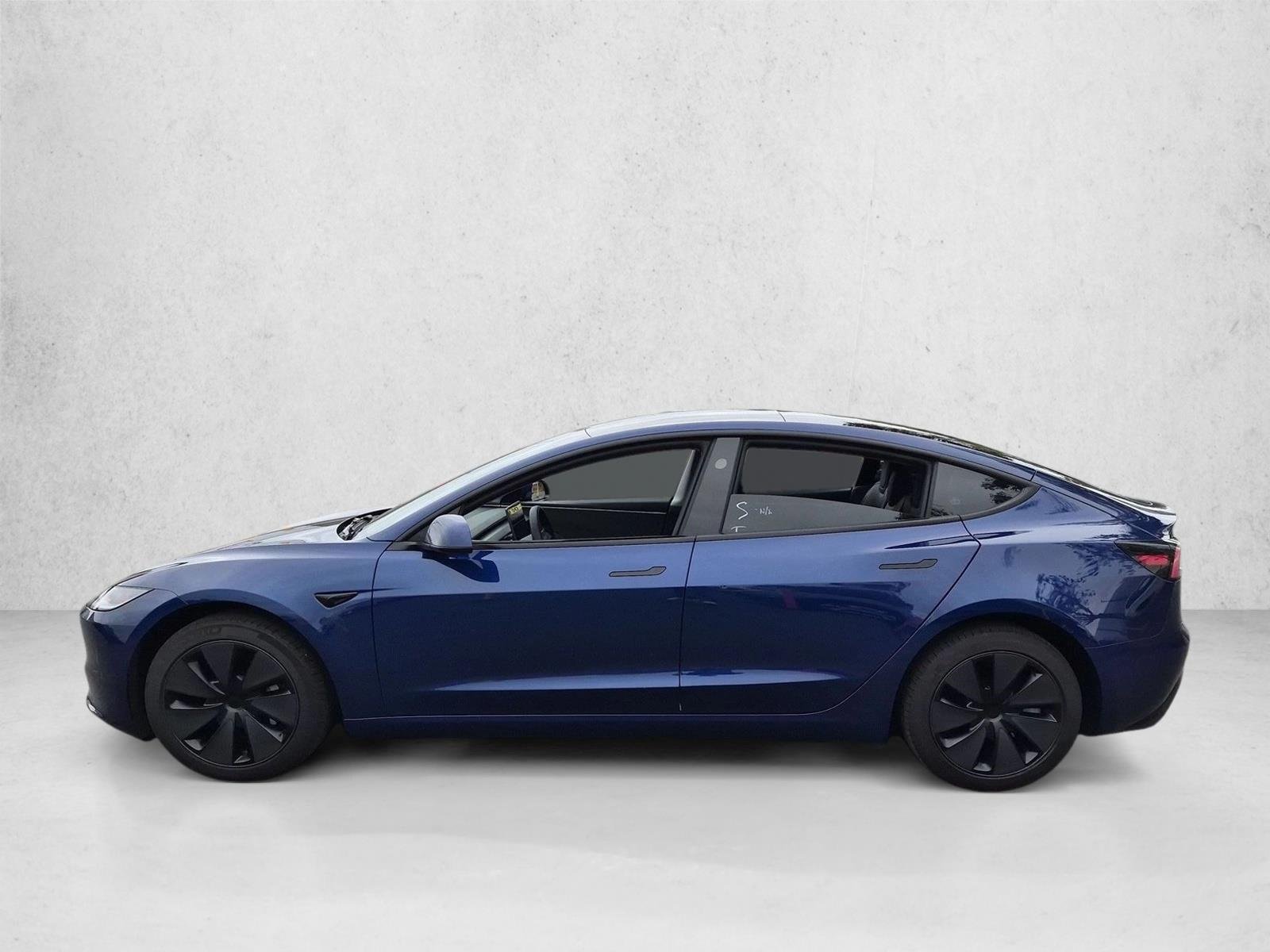 Used 2024 Deep Blue Metallic Tesla  image 8