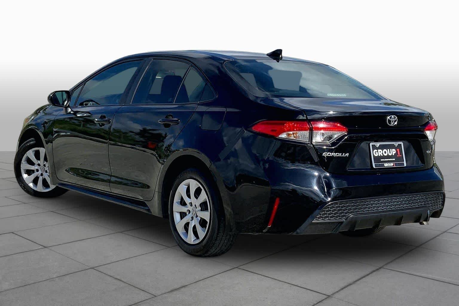 Used 2023 Midnight Black Metallic Toyota LE image 12