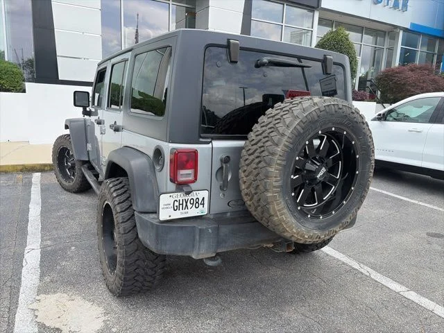 Used 2015 Silver Jeep Unlimited Sport image 7