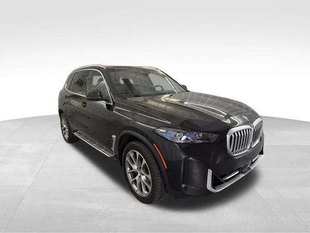 Used 2026 Black Sapphire Metallic BMW sDrive40i image 4