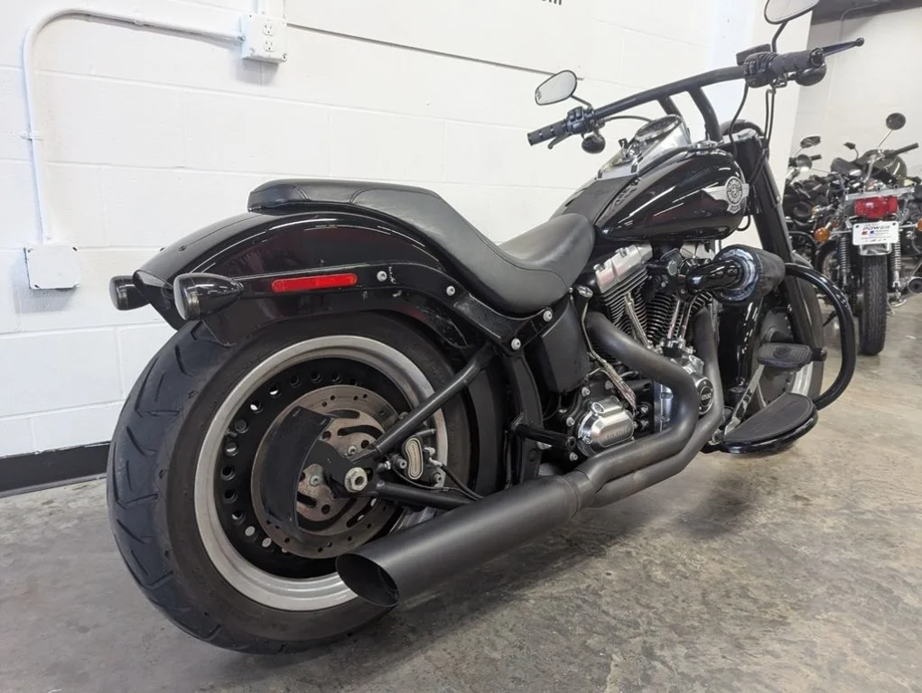 Used 2015 VIVID BLACK Harley-Davidson® FLSTFB - Fat Boy Lo image 9