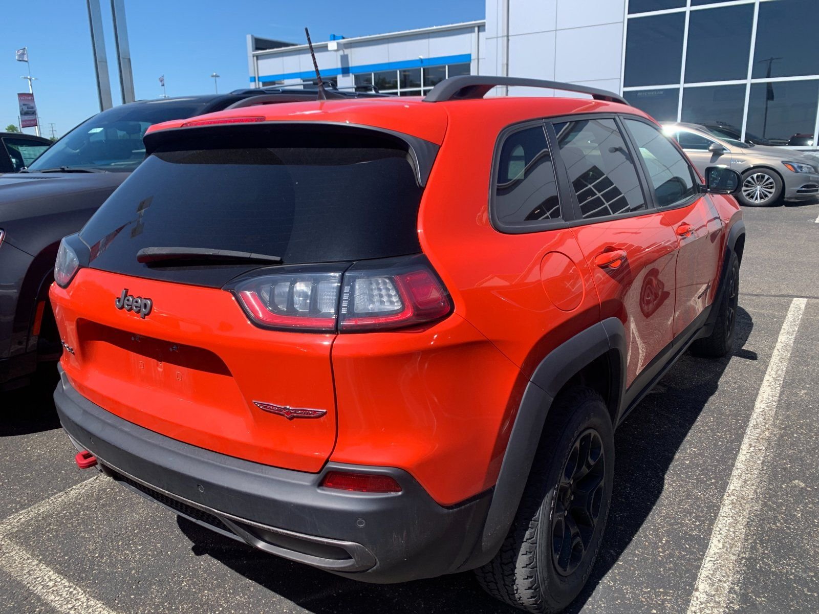 Used 2021 Orange Jeep Trailhawk image 2