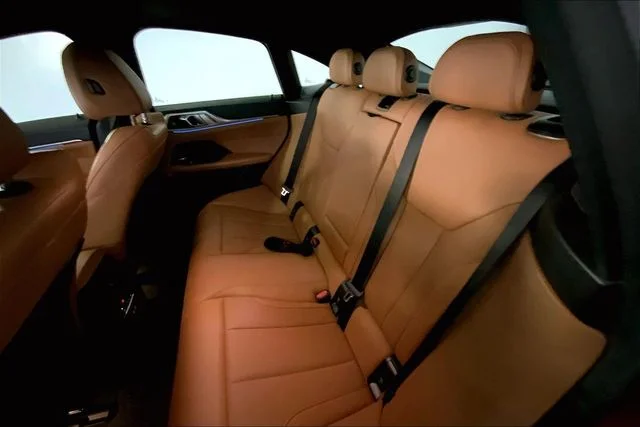 Used 2023 Sunset Orange Metallic BMW eDrive35 image 12