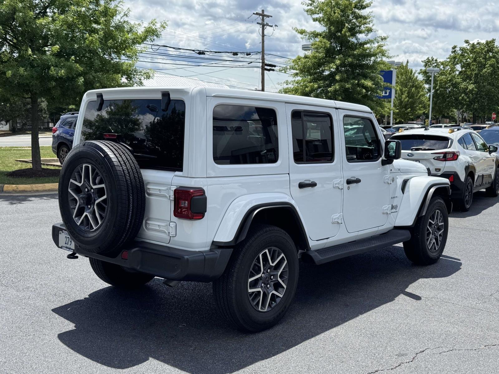 Used 2024 Bright White Clearcoat Jeep Sahara image 2