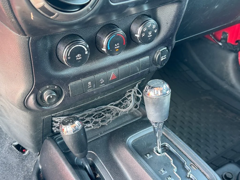 Used 2014 Red Jeep Unlimited Sport image 25