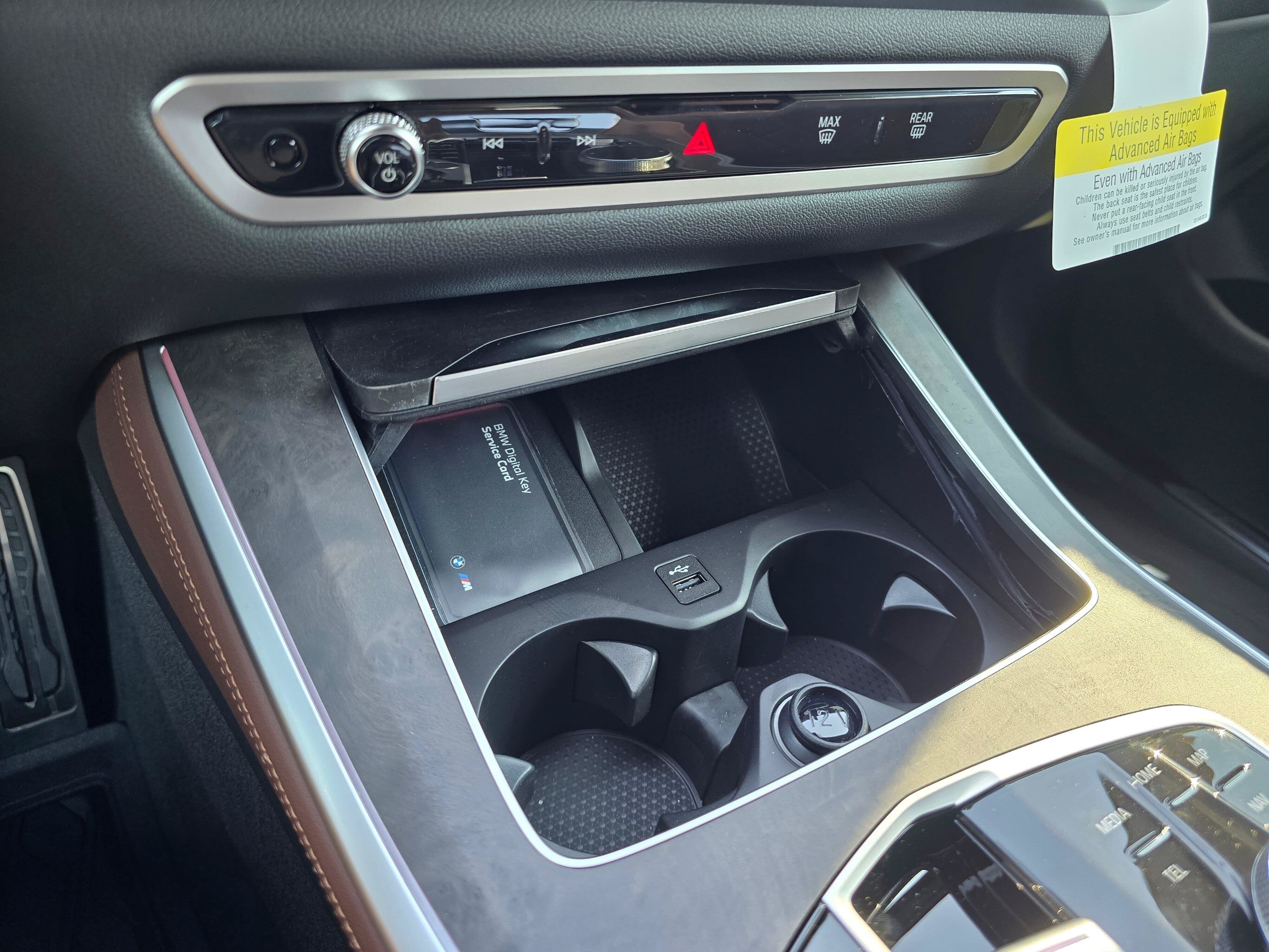 New 2026 Manhattan Green Metallic BMW xDrive50e image 21