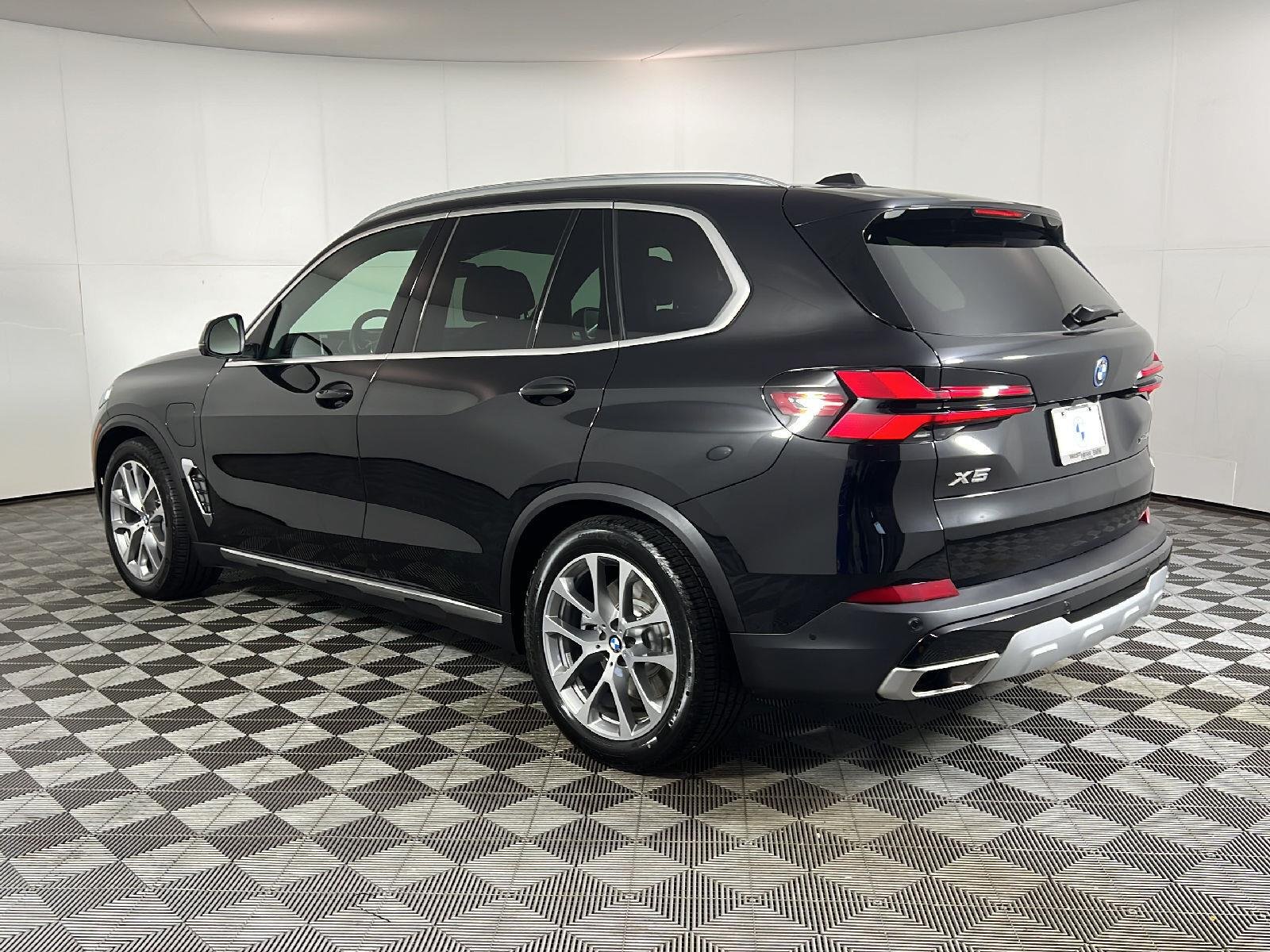 New 2026 Black Sapphire Metallic BMW xDrive50e image 5
