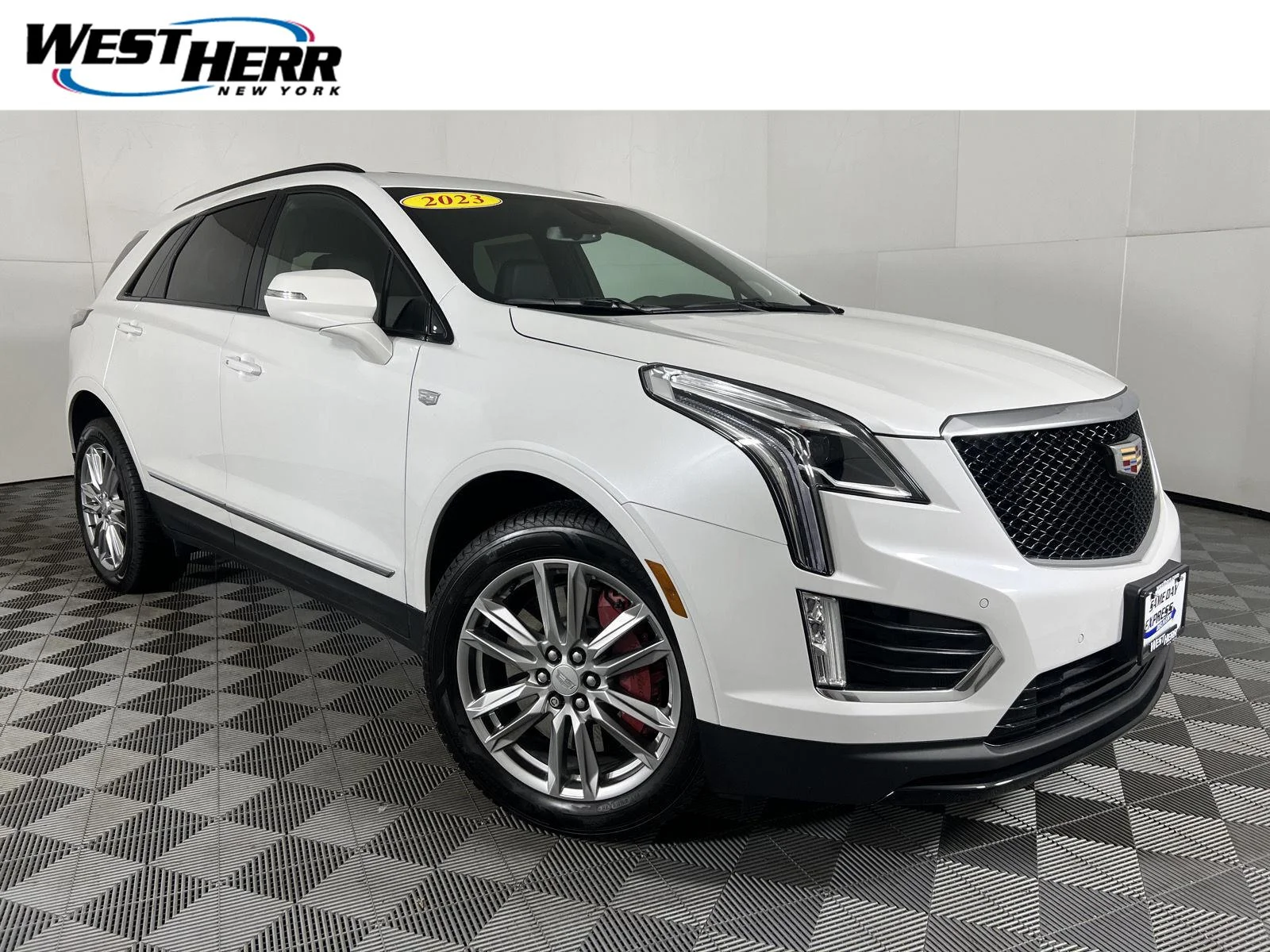 Used 2023 Crystal White Tricoat Cadillac AWD Sport image 1